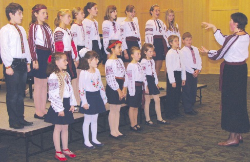 3 - The Holy Dormition of the Mother of God Church Children’s Choir conducted by Nadia Korol (right) – recipients of special award from Myron Barabash Scholarship Fund