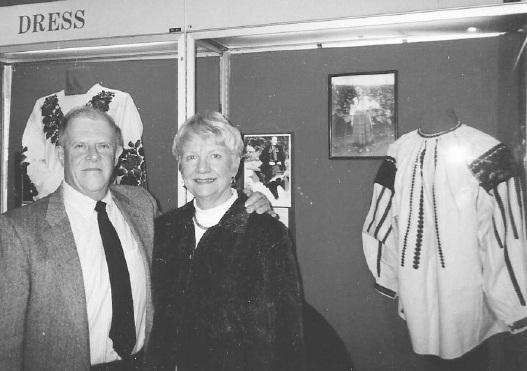 3 - Nicholas and Pat Melnik. The photo behind them is of Nicholas’s mother, Marianna, wearing her mother’s “sorochka”
