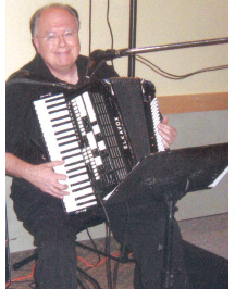 4 – Musician Ron Cahute on accordion pays tribute to Mothers
