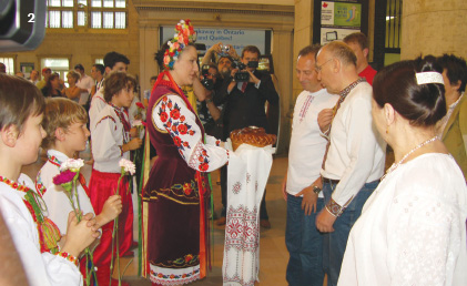 2 – Greeted with Ukrainian traditional “Bread and Salt” by Barvinok Dance Ensemble