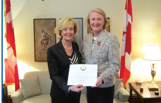 Dr. Christine Turkewych (right) received Jubilee Medal presented by Sen. Raynell Andreychuk