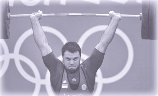 3 - Третю золоту медаль виборов важкоатлет Олексій Торохтій
