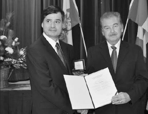 (L. to R.): Consul General of the Republic of Poland in Toronto, Hon. Marek Ciesielczuk, and Yuri Shymko