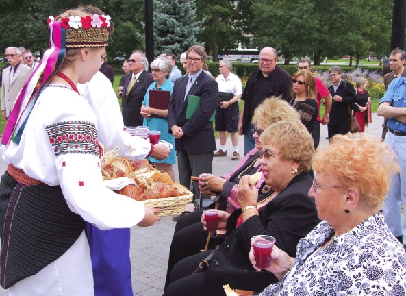 3 - VIPs and guests looking on while Yaremko Sisters sharing in Breaking of Bread ritual