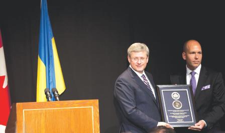 1 - Prime Minister Stephen Harper (left) awarded the Shevchenko Medal by UCC President Paul Grod (right)