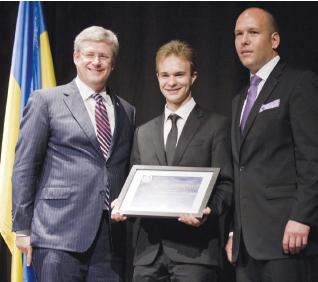 3 - UCC Youth Leadership Award recipient Andrew Wodoslawsky (centre) with PM Harper (left) and Paul Grod (right)