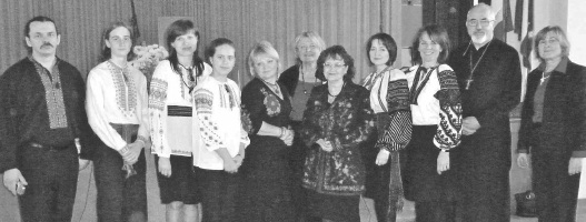 Bohdanna Klecor-Hawryluk, Chairperson UCC Montreal Cultural Committee (centre-right), Zorianna Hrycenko-Luhova, President of UCC Montreal (centre-back), guest speaker Rev. Dr. Mitrat Ihor Kutash (second from right), Oksana Sztyk, UCC Board Member (far right), with concert performers